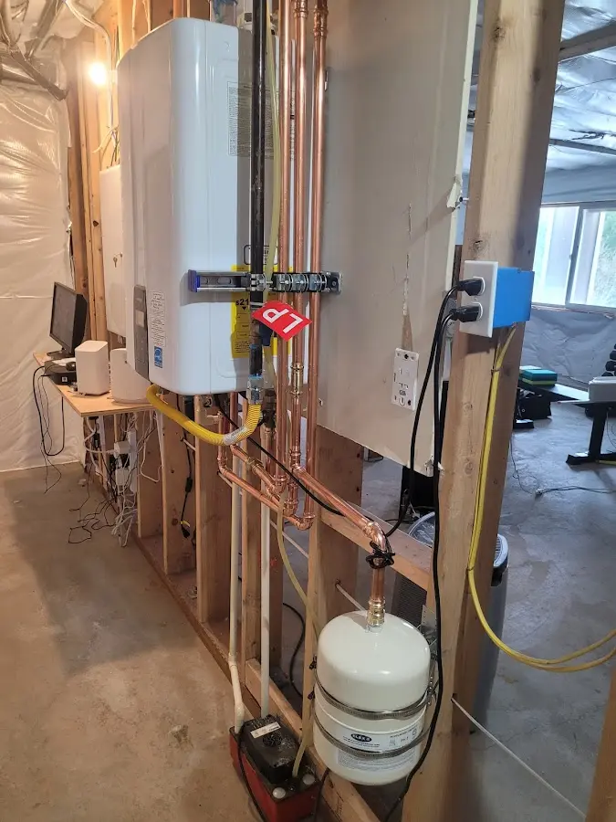 Licensed plumber repairing a kitchen sink in Ocean View
